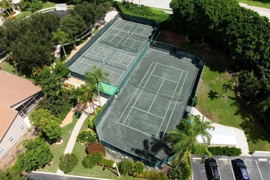 This stunning residence features 3 spacious bedrooms and 3 full on Westchester Golf and Country Club in Florida - for sale on GolfHomes.com, golf home, golf lot