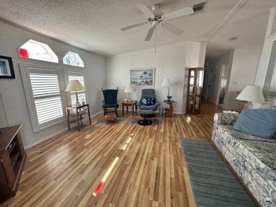 PRICE REDUCED $10,000! Nestled on a quiet lot on La Costa Lane on Four Lakes Golf Club in Florida - for sale on GolfHomes.com, golf home, golf lot
