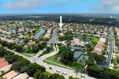 This stunning residence features 3 spacious bedrooms and 3 full on Westchester Golf and Country Club in Florida - for sale on GolfHomes.com, golf home, golf lot