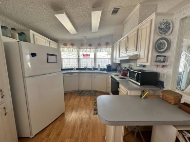 PRICE REDUCED $10,000! Nestled on a quiet lot on La Costa Lane on Four Lakes Golf Club in Florida - for sale on GolfHomes.com, golf home, golf lot