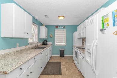This spacious 4 Bedroom 3 Bath raised beach house is just a very on Prestwick Country Club in South Carolina - for sale on GolfHomes.com, golf home, golf lot