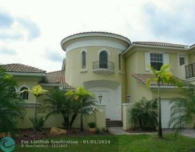 BEAUTIFUL 6/5 SFH PLUS STUDY,  IN THE HERON ISLES, HERON BAY; on Heron Bay Golf Club in Florida - for sale on GolfHomes.com, golf home, golf lot