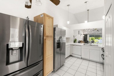 Currently the best-priced villa on the market at the time of on Royal Palm Golf Club in Florida - for sale on GolfHomes.com, golf home, golf lot