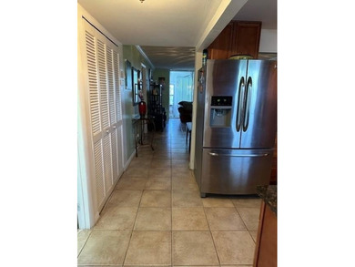 Beautiful water view updated 1 bedroom, 1 1/2 bath condo on Sunrise Lakes Phase III in Florida - for sale on GolfHomes.com, golf home, golf lot