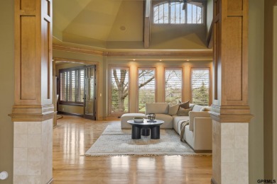This gorgeous, custom-built home sits on a nearly 1-acre lot on Indian Creek Golf Club in Nebraska - for sale on GolfHomes.com, golf home, golf lot