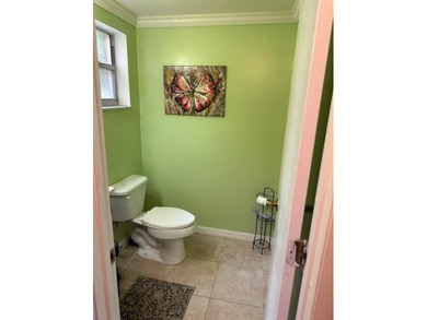 Beautiful water view updated 1 bedroom, 1 1/2 bath condo on Sunrise Lakes Phase III in Florida - for sale on GolfHomes.com, golf home, golf lot