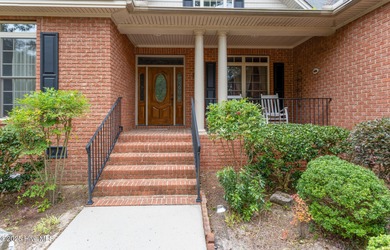 A lightly used second home overlooking the eighteenth green of on Beacon Ridge Golf and Country Club in North Carolina - for sale on GolfHomes.com, golf home, golf lot