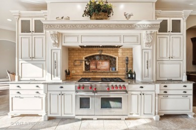 This exquisite custom beauty can be found in the gorgeous on Woodstock Country Club in Illinois - for sale on GolfHomes.com, golf home, golf lot