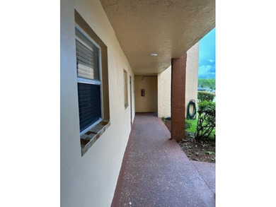 Beautiful water view updated 1 bedroom, 1 1/2 bath condo on Sunrise Lakes Phase III in Florida - for sale on GolfHomes.com, golf home, golf lot