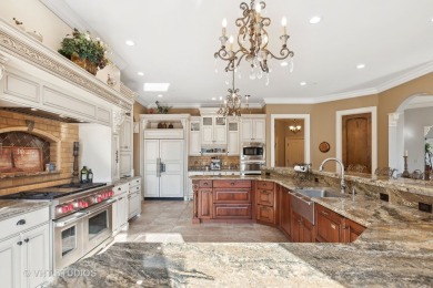 This exquisite custom beauty can be found in the gorgeous on Woodstock Country Club in Illinois - for sale on GolfHomes.com, golf home, golf lot