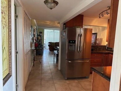 Beautiful water view updated 1 bedroom, 1 1/2 bath condo on Sunrise Lakes Phase III in Florida - for sale on GolfHomes.com, golf home, golf lot