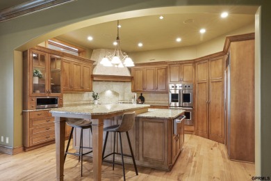 This gorgeous, custom-built home sits on a nearly 1-acre lot on Indian Creek Golf Club in Nebraska - for sale on GolfHomes.com, golf home, golf lot
