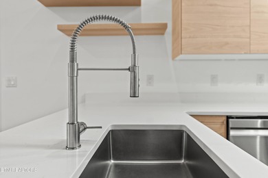 Recently remodeled with high-end finishes, this stunning home on Druid Hills Golf Club in Tennessee - for sale on GolfHomes.com, golf home, golf lot