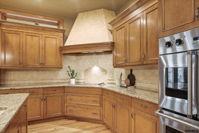 This gorgeous, custom-built home sits on a nearly 1-acre lot on Indian Creek Golf Club in Nebraska - for sale on GolfHomes.com, golf home, golf lot