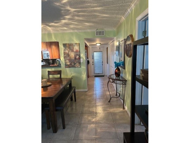 Beautiful water view updated 1 bedroom, 1 1/2 bath condo on Sunrise Lakes Phase III in Florida - for sale on GolfHomes.com, golf home, golf lot