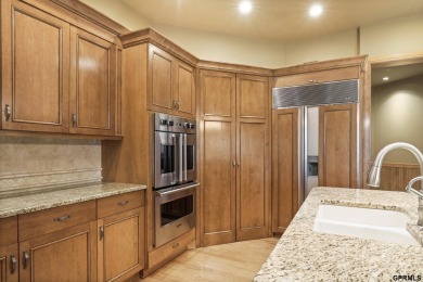 This gorgeous, custom-built home sits on a nearly 1-acre lot on Indian Creek Golf Club in Nebraska - for sale on GolfHomes.com, golf home, golf lot