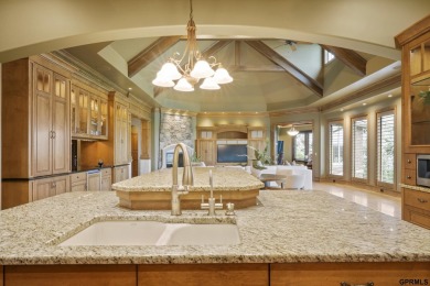 This gorgeous, custom-built home sits on a nearly 1-acre lot on Indian Creek Golf Club in Nebraska - for sale on GolfHomes.com, golf home, golf lot