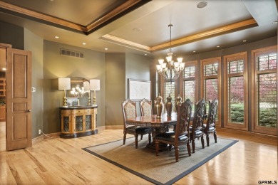 This gorgeous, custom-built home sits on a nearly 1-acre lot on Indian Creek Golf Club in Nebraska - for sale on GolfHomes.com, golf home, golf lot