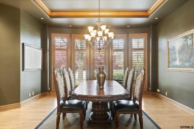 This gorgeous, custom-built home sits on a nearly 1-acre lot on Indian Creek Golf Club in Nebraska - for sale on GolfHomes.com, golf home, golf lot