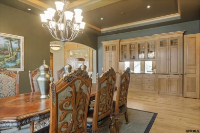 This gorgeous, custom-built home sits on a nearly 1-acre lot on Indian Creek Golf Club in Nebraska - for sale on GolfHomes.com, golf home, golf lot