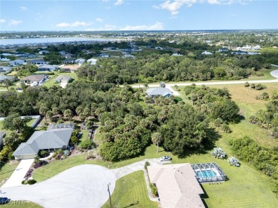Build your Florida dream home on this oversized lot tucked away on Rotonda Golf and Country Club The Palms Course in Florida - for sale on GolfHomes.com, golf home, golf lot