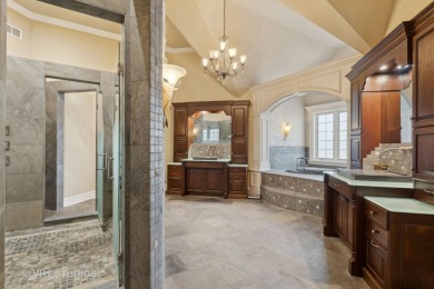 This exquisite custom beauty can be found in the gorgeous on Woodstock Country Club in Illinois - for sale on GolfHomes.com, golf home, golf lot