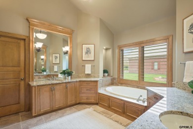 This gorgeous, custom-built home sits on a nearly 1-acre lot on Indian Creek Golf Club in Nebraska - for sale on GolfHomes.com, golf home, golf lot