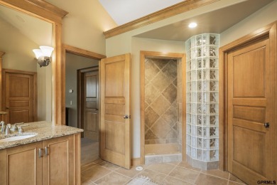 This gorgeous, custom-built home sits on a nearly 1-acre lot on Indian Creek Golf Club in Nebraska - for sale on GolfHomes.com, golf home, golf lot