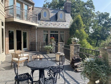 This exquisite custom beauty can be found in the gorgeous on Woodstock Country Club in Illinois - for sale on GolfHomes.com, golf home, golf lot