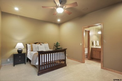 This gorgeous, custom-built home sits on a nearly 1-acre lot on Indian Creek Golf Club in Nebraska - for sale on GolfHomes.com, golf home, golf lot