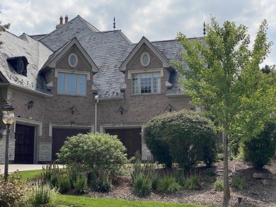 This exquisite custom beauty can be found in the gorgeous on Woodstock Country Club in Illinois - for sale on GolfHomes.com, golf home, golf lot