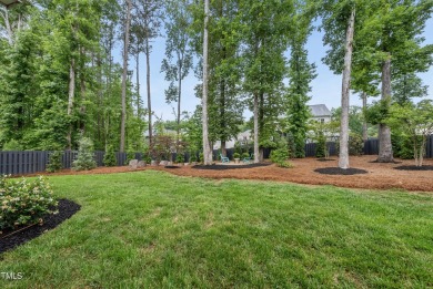 Welcome to your luxury retreat in the prestigious Hasentree on Hasentree Club in North Carolina - for sale on GolfHomes.com, golf home, golf lot