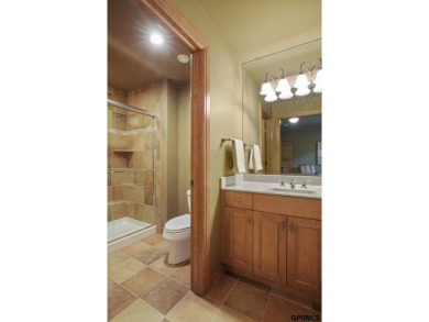 This gorgeous, custom-built home sits on a nearly 1-acre lot on Indian Creek Golf Club in Nebraska - for sale on GolfHomes.com, golf home, golf lot