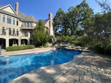 This exquisite custom beauty can be found in the gorgeous on Woodstock Country Club in Illinois - for sale on GolfHomes.com, golf home, golf lot