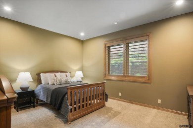 This gorgeous, custom-built home sits on a nearly 1-acre lot on Indian Creek Golf Club in Nebraska - for sale on GolfHomes.com, golf home, golf lot