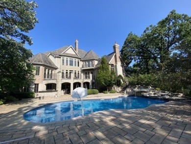 This exquisite custom beauty can be found in the gorgeous on Woodstock Country Club in Illinois - for sale on GolfHomes.com, golf home, golf lot