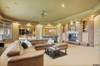 This gorgeous, custom-built home sits on a nearly 1-acre lot on Indian Creek Golf Club in Nebraska - for sale on GolfHomes.com, golf home, golf lot