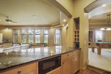 This gorgeous, custom-built home sits on a nearly 1-acre lot on Indian Creek Golf Club in Nebraska - for sale on GolfHomes.com, golf home, golf lot