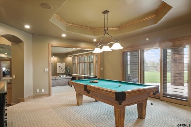 This gorgeous, custom-built home sits on a nearly 1-acre lot on Indian Creek Golf Club in Nebraska - for sale on GolfHomes.com, golf home, golf lot
