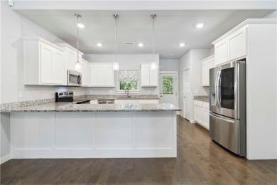 Step into comfort with this inviting 3-bedroom, 2-bath home on Bella Vista - Metfield Golf Complex and Country Club in Arkansas - for sale on GolfHomes.com, golf home, golf lot