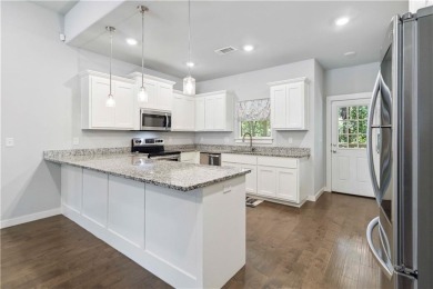 Step into comfort with this inviting 3-bedroom, 2-bath home on Bella Vista - Metfield Golf Complex and Country Club in Arkansas - for sale on GolfHomes.com, golf home, golf lot