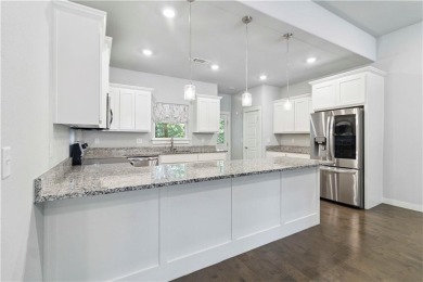 Step into comfort with this inviting 3-bedroom, 2-bath home on Bella Vista - Metfield Golf Complex and Country Club in Arkansas - for sale on GolfHomes.com, golf home, golf lot
