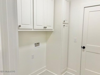 Gorgeous New Construction in Pinehurst of Lake Caroline! Come on Lake Caroline Golf Club in Mississippi - for sale on GolfHomes.com, golf home, golf lot