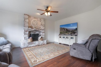 Come and explore this stunning brick residence in Fairway Oaks on Abilene Country Club - South Course in Texas - for sale on GolfHomes.com, golf home, golf lot