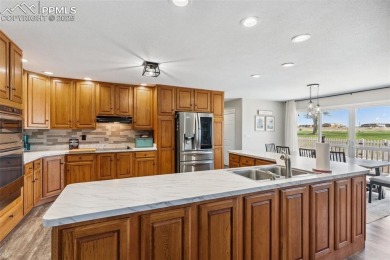This beautifully updated rancher is a true gem--backing right up on Desert Hawk At Pueblo West in Colorado - for sale on GolfHomes.com, golf home, golf lot