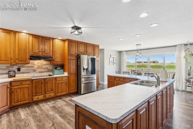 This beautifully updated rancher is a true gem--backing right up on Desert Hawk At Pueblo West in Colorado - for sale on GolfHomes.com, golf home, golf lot