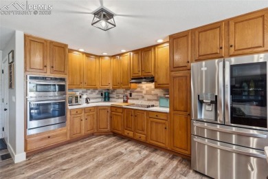 This beautifully updated rancher is a true gem--backing right up on Desert Hawk At Pueblo West in Colorado - for sale on GolfHomes.com, golf home, golf lot