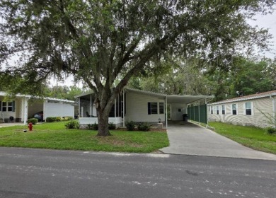 This 2 Bedroom, 2 Bathroom is Light and Bright!! The Livingroom on Plantation Golf Club in Florida - for sale on GolfHomes.com, golf home, golf lot