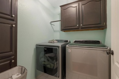 Come and explore this stunning brick residence in Fairway Oaks on Abilene Country Club - South Course in Texas - for sale on GolfHomes.com, golf home, golf lot