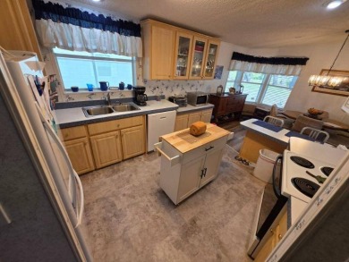 This 2 Bedroom, 2 Bathroom is Light and Bright!! The Livingroom on Plantation Golf Club in Florida - for sale on GolfHomes.com, golf home, golf lot